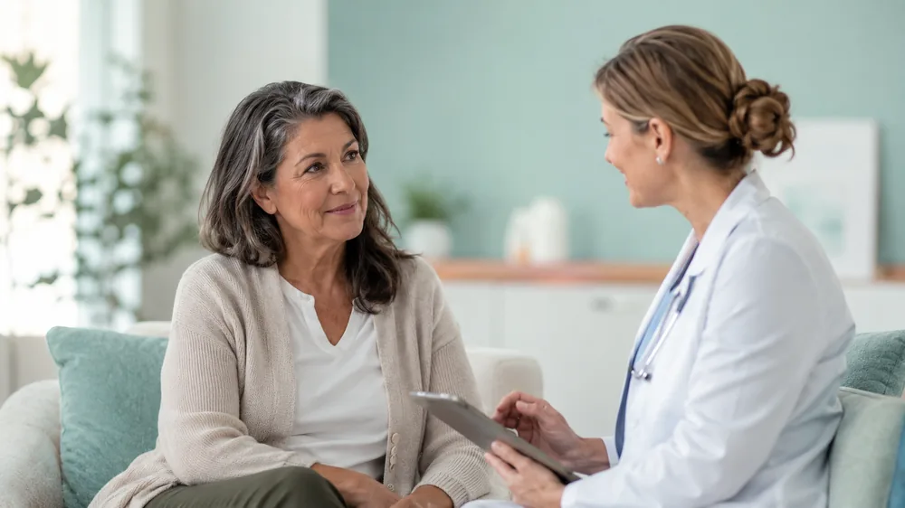 Woman in her fifties talking with her doctor about menopause and bladder health