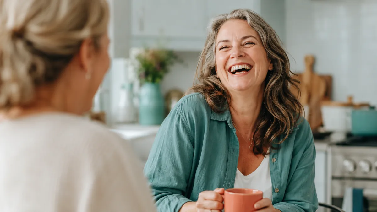confident woman over 40 laughing without worrying about bladder leaks 2026